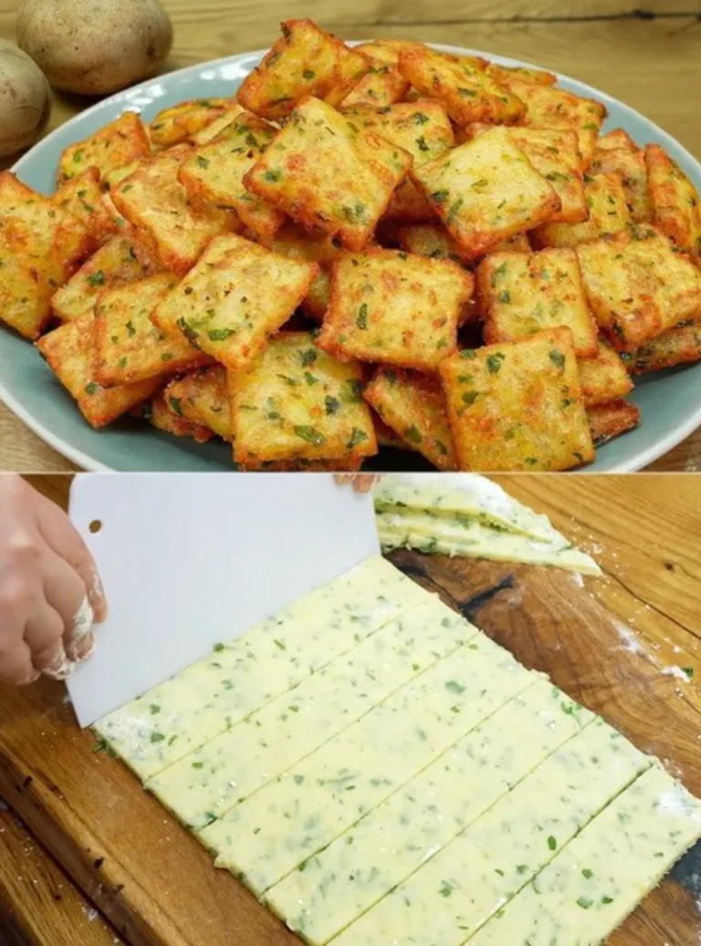 Zlaté zemiakové štvorčeky pripravené na tanieri so zeleninou.